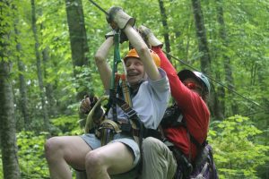 Sue coming in for a landing at the end of the zip lining course
